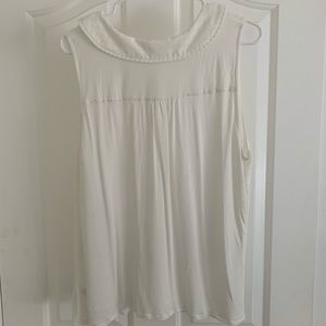 white sleeveless blouse